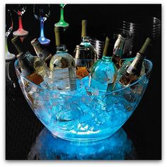 bowl of ice and drinks with glow sticks